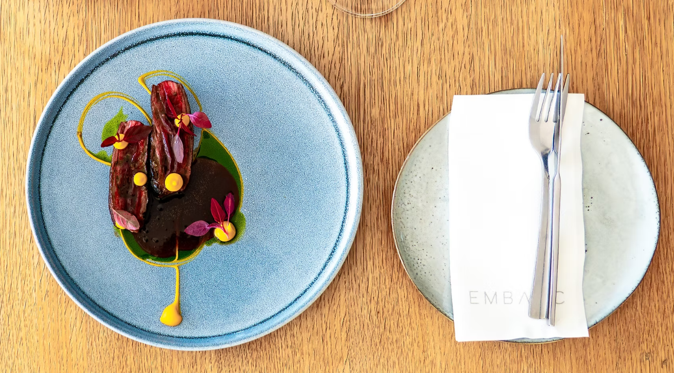 A stylish plate of gourmet-style meat at Embarc Restaurant