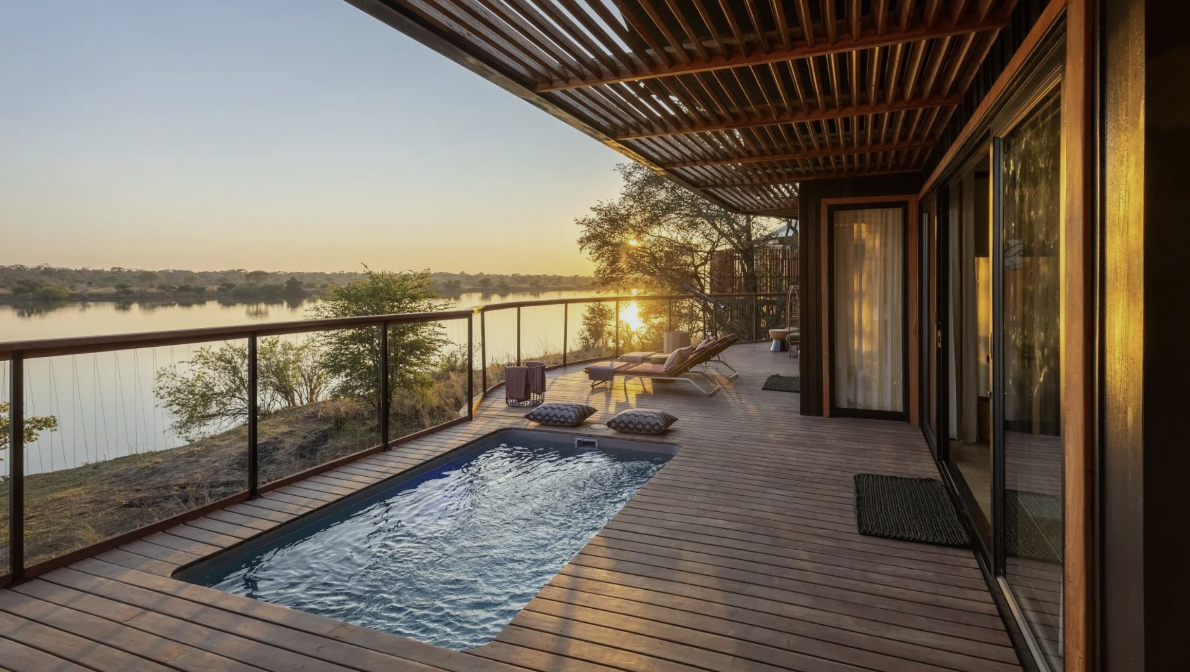 Anantara-Kafue-River-Tented-Camp-Villa-Private-Pool A private deck with a plunge pool overlooks the river at sunset, offering a calm retreat within the new luxury safari lodges 2026.