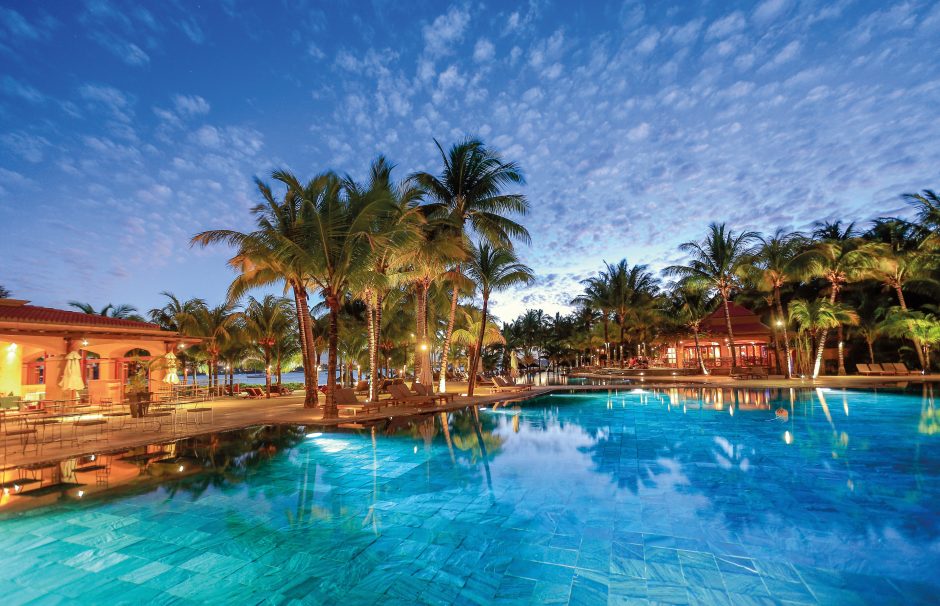 Le Mauricia Pool at night at Mauricia Beachcomber Resort & Spa
