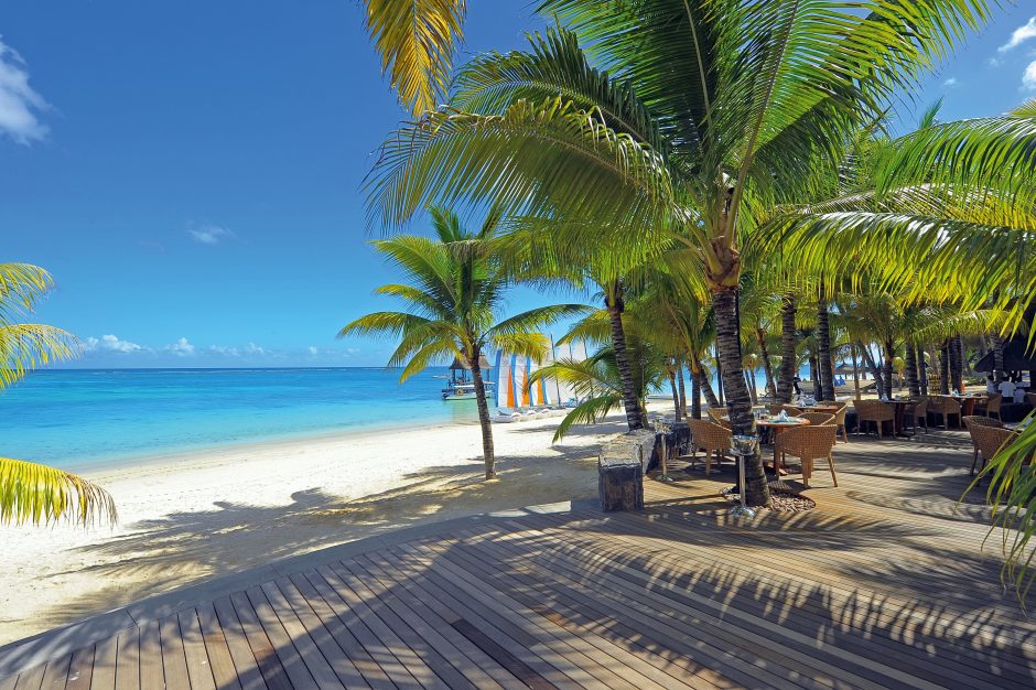 Trou aux Biches Resort & Spa Palms on beach at Trou aux Biches Beachcomber in Mauritius